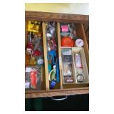 Drawer of scissors, tape measure, screws, hand
