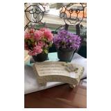 Outdoor planters and small garden bench decor