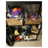 Shelf unit of misc contents only. Garden flags