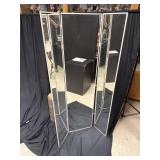 Trifold standing mirror, donated by Sally Fink