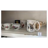 Shelf of assorted mugs