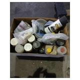 Box of paint and chemicals