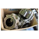 Box of Ford Hubcaps