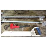 Shower Rails, Pipe Wrench, and Handsaw