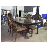 Double pedestal wooden dining table with 4