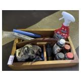 Wooden caddy with various items