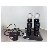 dreamGEAR charging station holding two Sony