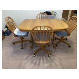 Oak dining set with laminated table top & 4