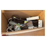 Box of Power Strips and Cords