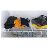 Assortment of Beanies, Gloves, and Coat Hangers