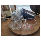 Cake decoration items juicer and Pyrex measuring