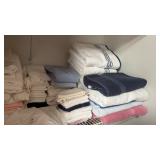 Shelf of Bedding and Towels