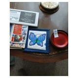 Lot of local maps, coasters, etc