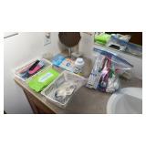 Lot of Combs, Toothepaste, bathroom items on sink