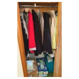 Lot of Clothing in Closet