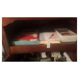 Shelf lot of Cards, Calculators, etc