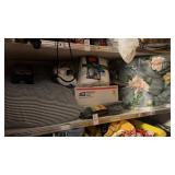 Shelf lot of socks and comforter