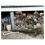 Lot of Firewood Under Porch BRING HELP TO REMOVE