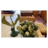 Bird statute decor and ceramic fruit basket.
