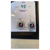 Inspired Silver pierced Trump earrings. New