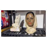 Praying Hands and Woman Bust