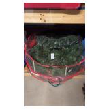 Two Christmas Wreaths In Cases