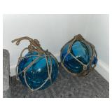 2 blue glass outdoor decor