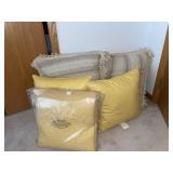 Large floor pillows, yellow quilt & pillows