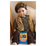 2 Heavy Bisque Seated Collector Boy Dolls