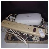 Surge protector strip, assorted extension cords