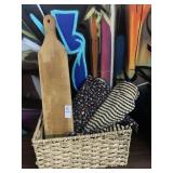 Basket, wooden trivet & table linens