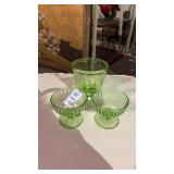Two Uranium Glass Dessert Cups and Measuring Cup