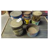 assortment of vintage tin cans