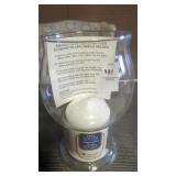 Floating pillar candle holder