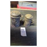 Pair of antique tin salt shakers