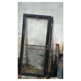Used storm door & scrap metal