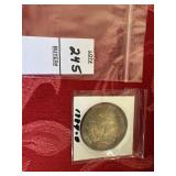 1884 O Morgan Dollar toned