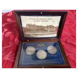 Three Morgan silver dollars, 1886 O, 1896 O, 1900