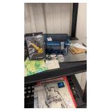 Khazmodam necklace, scissors and outdoor box.