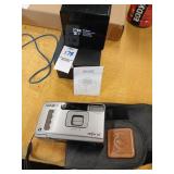 Minolta camera and Bluetooth speaker