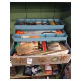 Gun cleaning items in metal box