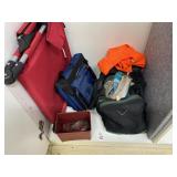 Two stadium chairs, gun cleaning supplies, orange