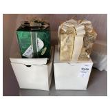 Two Christmas gift music boxes