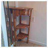 Corner accent table 34 inches tall with drawer