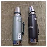 Two Stanley quart bottles
