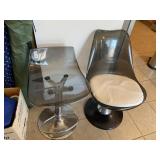 Two plastic swivel chairs