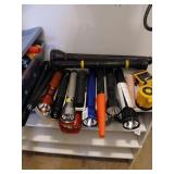 Shelf lot of Mag-Lites and misc flashlights