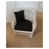 Pair of wicker chairs used indoors