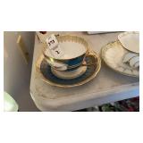 2 Assorted Teacups and Saucers