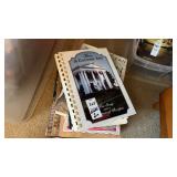 Assortment of Cookbooks and Flowers of the World